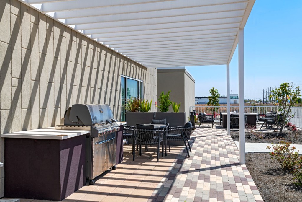 Outdoor patio with lounge and dining area